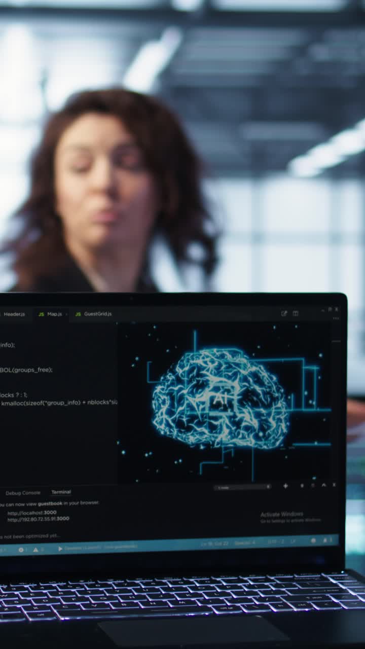 Vertical video AI driven notebook used for overseeing server clusters, close up