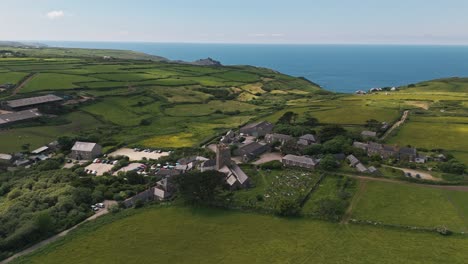 Drone circles left over rolling hills and cliffs near Zennor village on Cornwall’s scenic coastline
