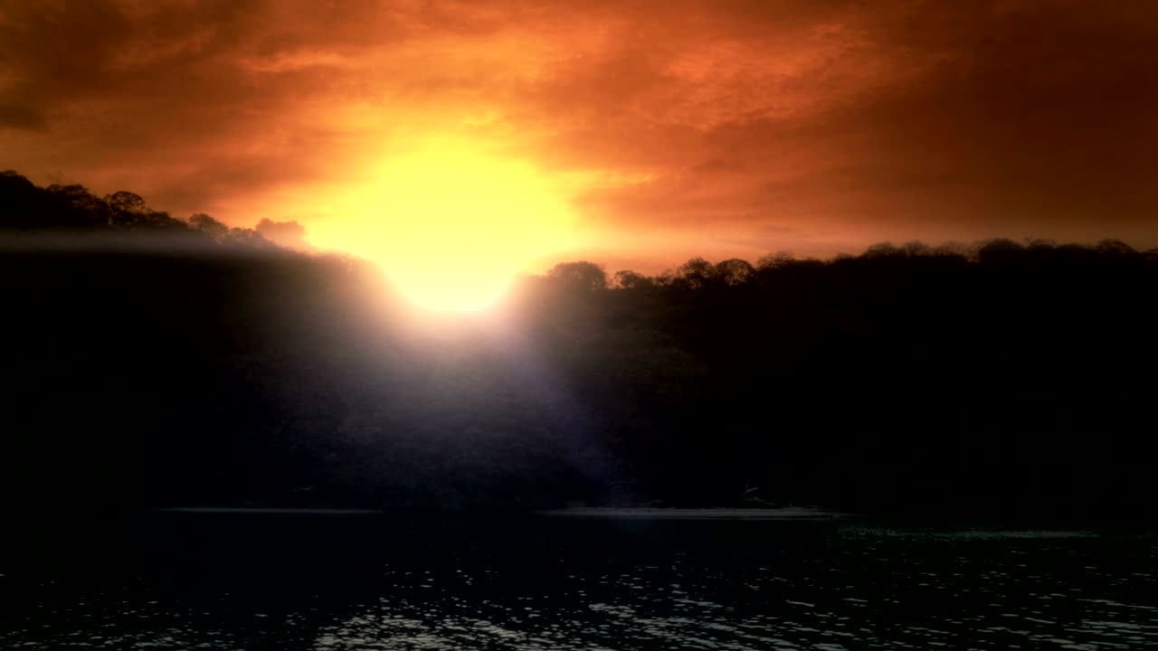 Einstellungsaufnahme eines tropischen Inselstrandes bei Sonnenuntergang.