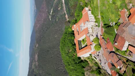 drone-shot-monastery-santo-estevo-of-ribas-of-sil,-ribeira-sacra,-nogueira-of-ramuín,-ourense,-galicia,-spain