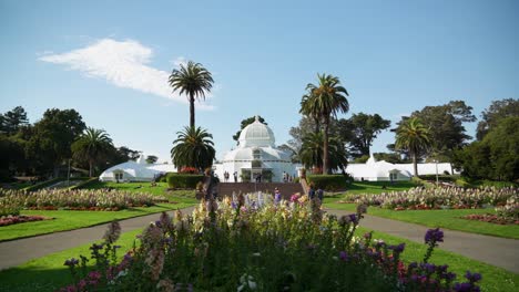 conservatory of flowers main building and people walking by 01