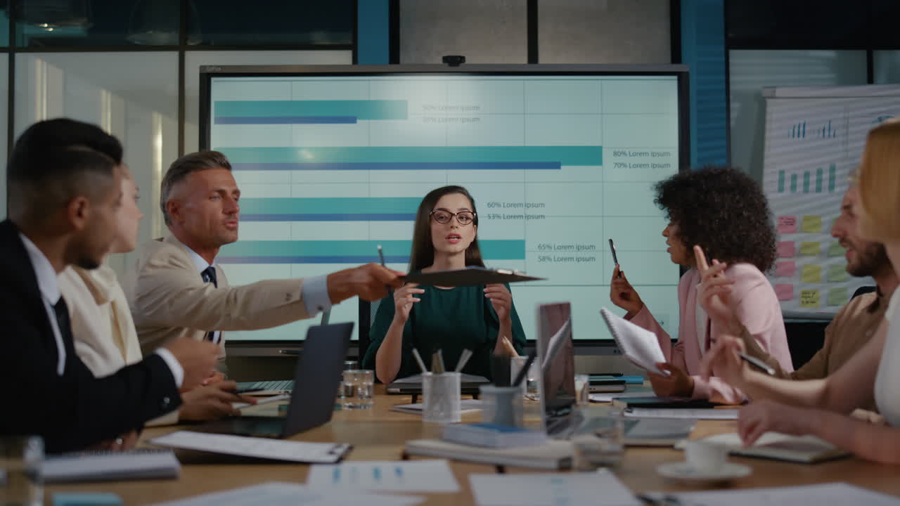 Top manager discussing business strategy with team members