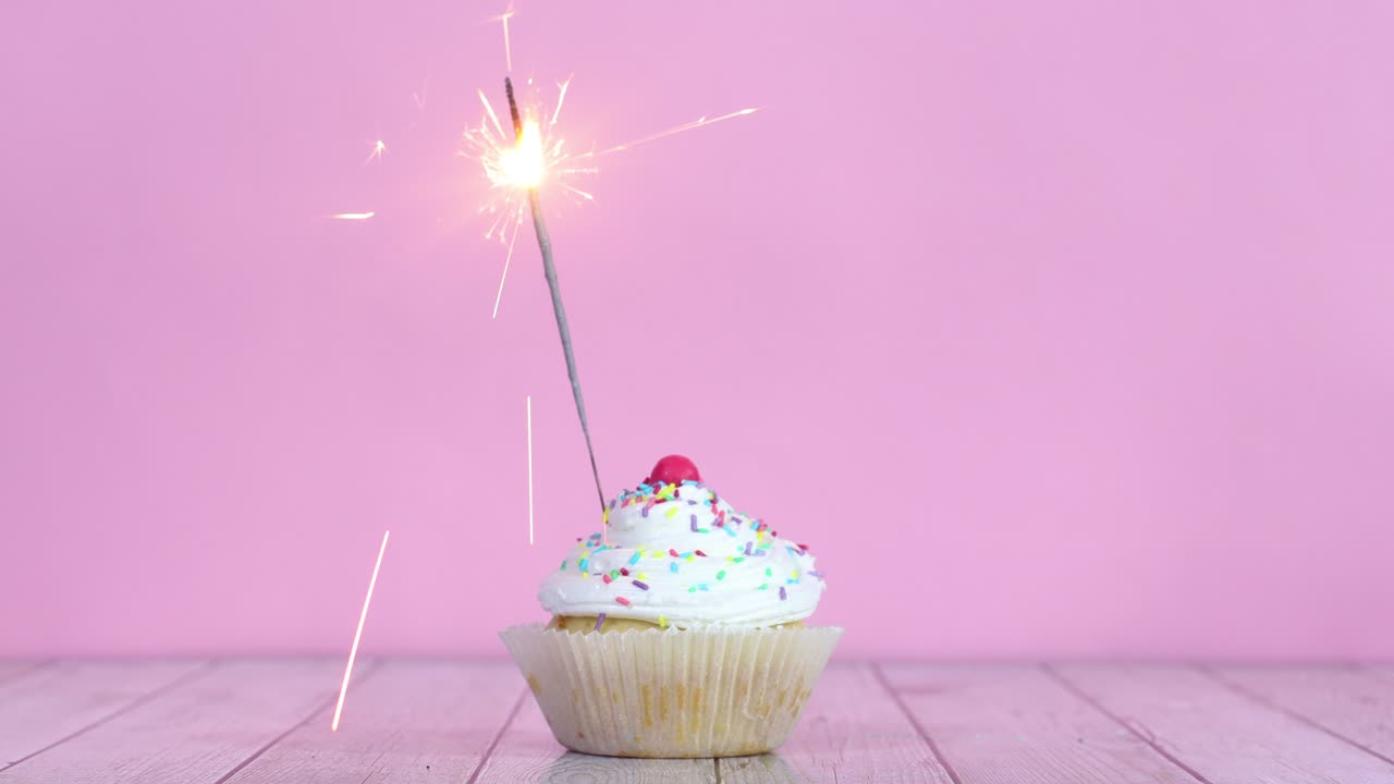 Burning fire candle on testy sweet cup cake with white cream