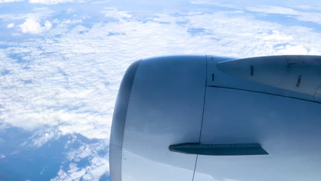 Airplane-engine-against-a-backdrop-of-cloudy-skies