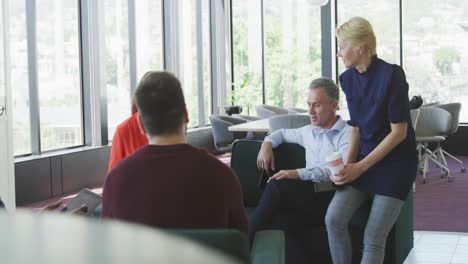 colleagues discussing in the office