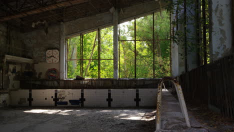 The-Prypiat-swimming-pool-sits-in-terminal-decay-35-years-after-it-was-abandoned-due-to-the-Chernobyl-Nuclear-Power-station-meltdown