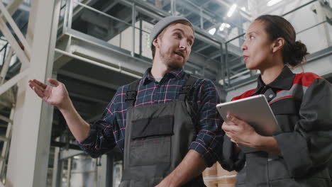 plant workers discussing polyethylene production