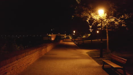 Empty-park-road-on-the-walls-of-Vysehrad-castle-at-night,Prague,Czechia,lockdown