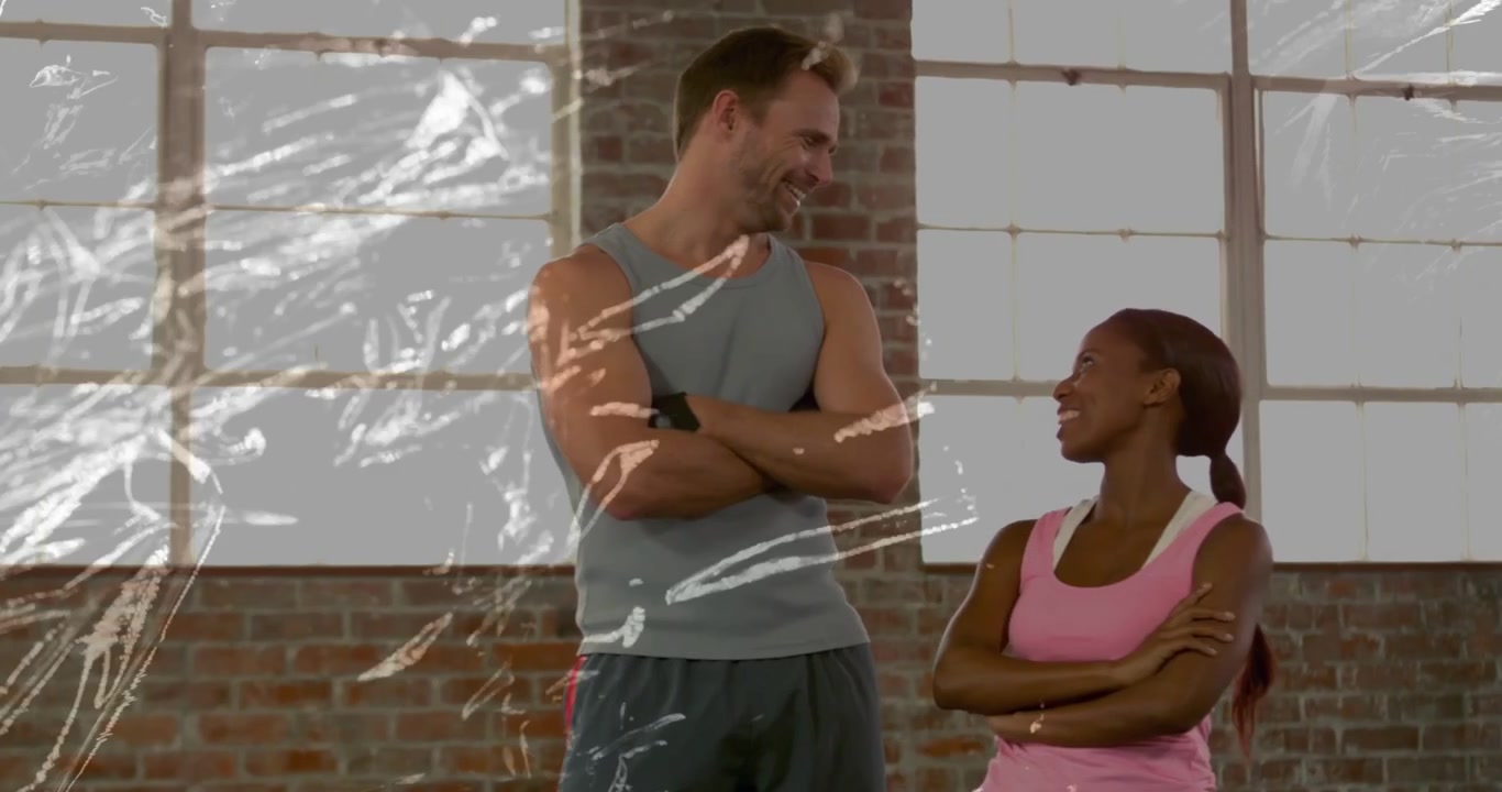 Man shifting gaze at woman, sparking smiles and laughter during workout chat with crinkled overlay