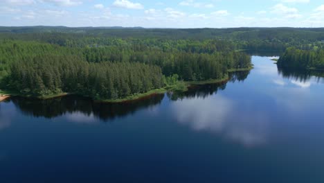 Aerial-Shot-of-Lake-and-Forest-at-Isaberg-Mountain-Resort-in-Sweden