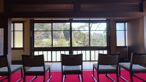 sunlight streaming through a japanese garden window, serene and peaceful atmosphere