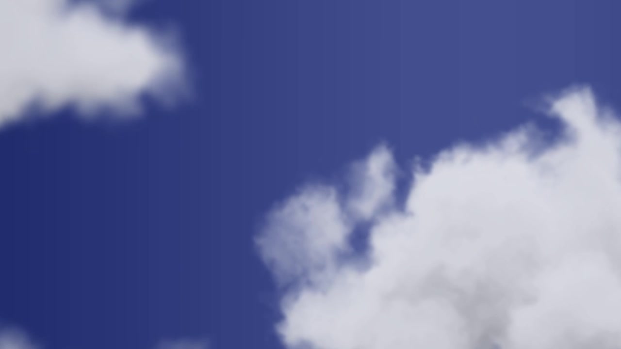 White Clouds Moving Across a Clear Blue Sky