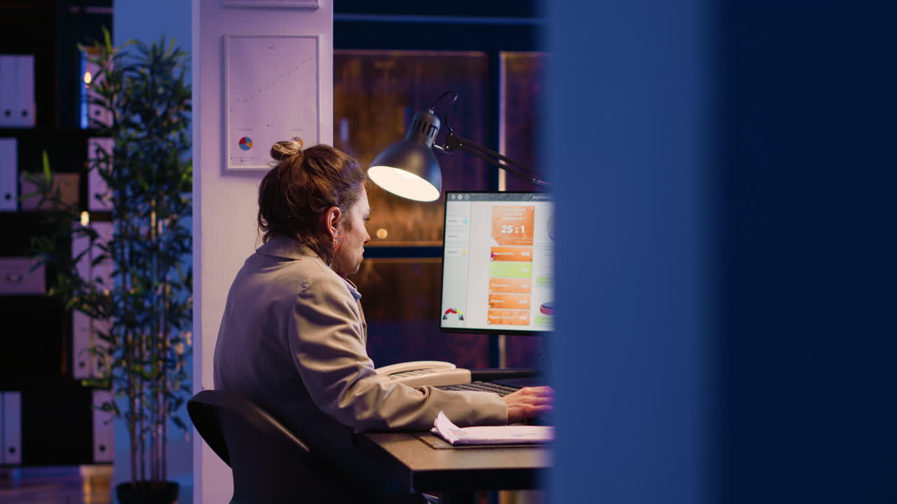 Woman working on computer in office