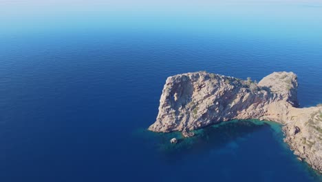 amazing drone view in 4k of the rock formation sa foradada at the west coast of mallorca - serra de tramuntana