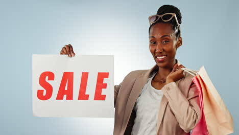 Happy-black-woman,-sale-sign