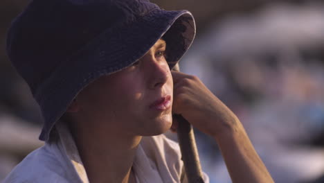 pensive boy in a hat