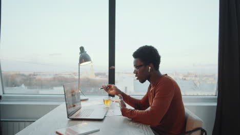 African-American-Businessman-Talking-on-Video-Call-in-Rooftop-Office