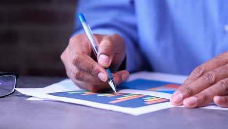 Person Analyzing a Chart