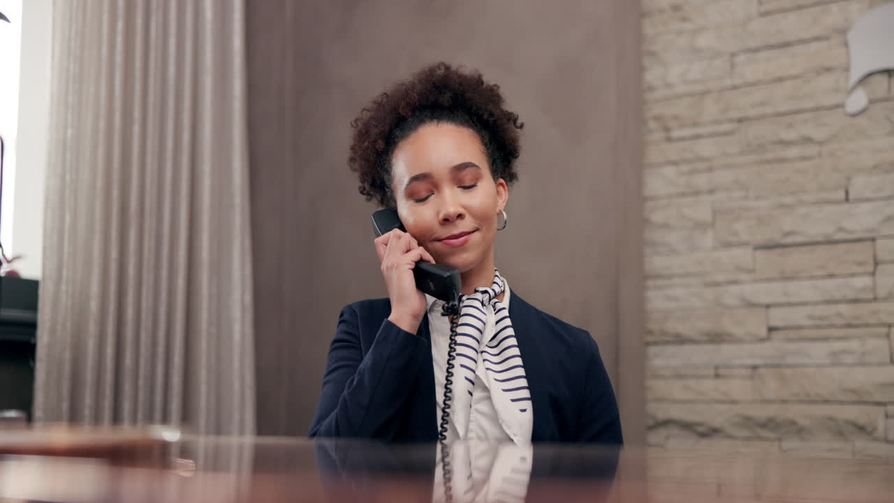 A businesswoman is talking on the phone