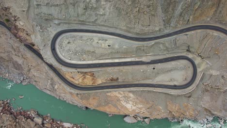aerial birds eye view of winding jaglot skardu road - jsr that connects gilgit region to baltistan region of gilgit baltistan