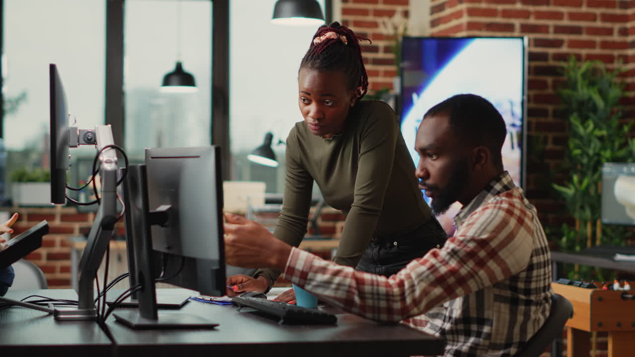 Professional team of developers working with 3d graphics software