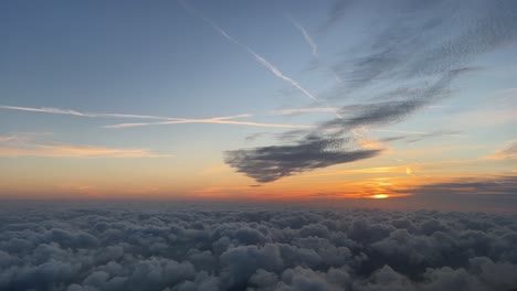 sunset recorded from a jet cockpit while flying at 4000m high over the mediterranean sea