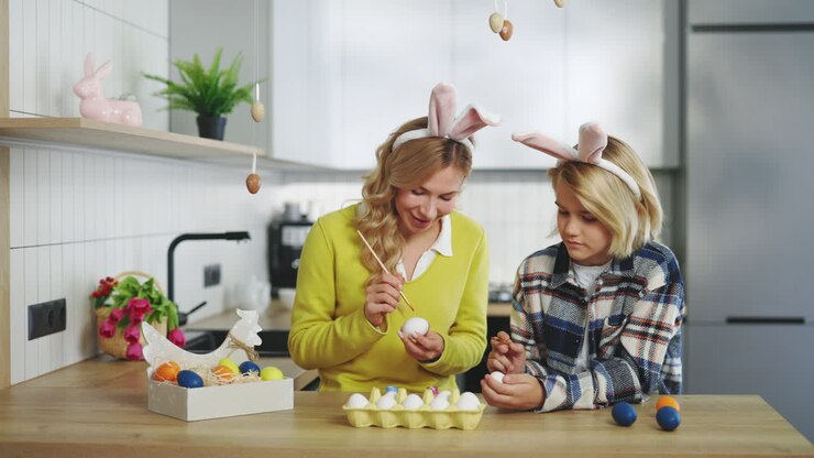 Mother and Daughter Painting Easter Eggs