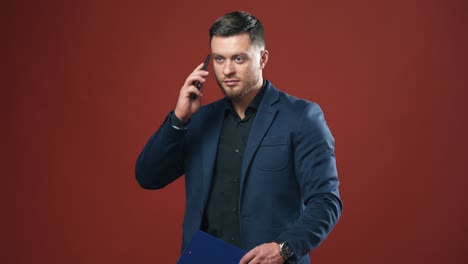 man with mobile phone. businessman with smartphone texting