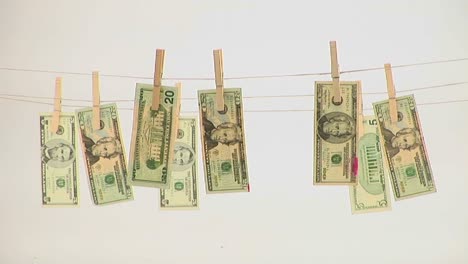 money hangs on a clothesline