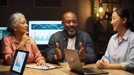 engaging discussion among business professionals in a data-driven environment, showcasing collaboration and insightful interaction in a modern workspace