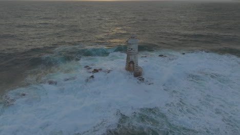 between sky and sea: magical sunset at mangiabarche lighthouse in sardinia