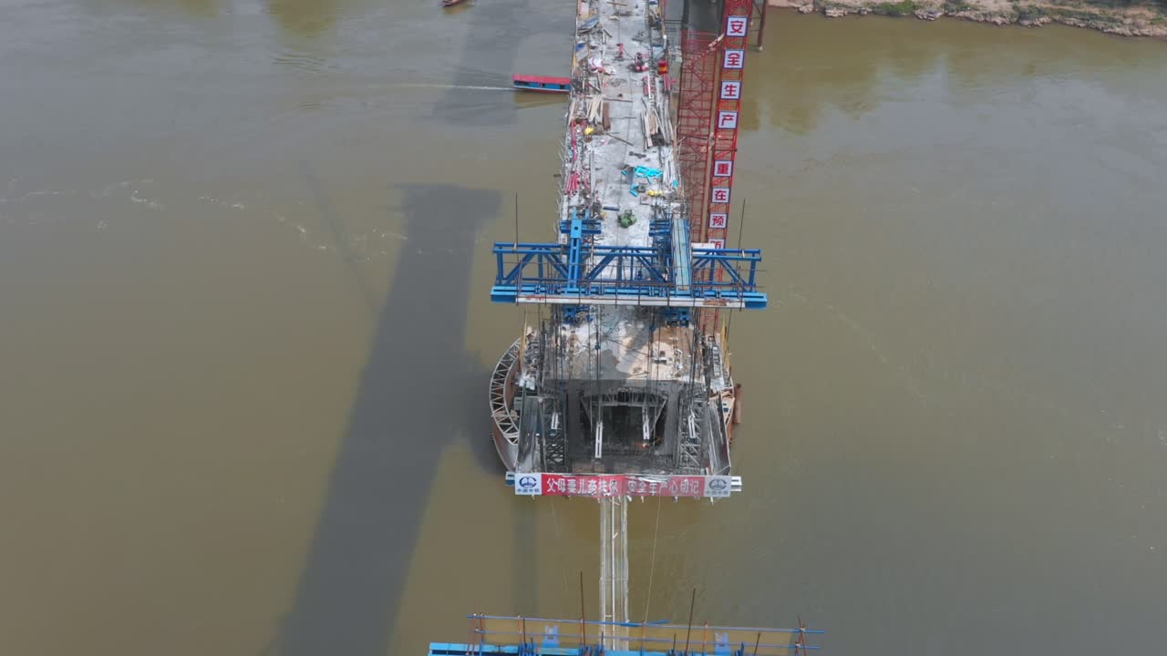 Bridge Under Construction Over a River