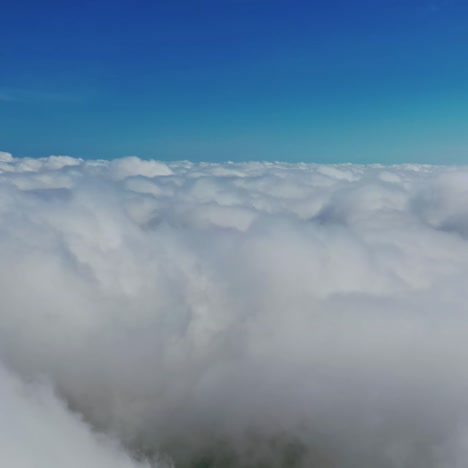 soft clouds background. amazing white clouds under clear blue sky. travelling by cloudscape. view in the air.