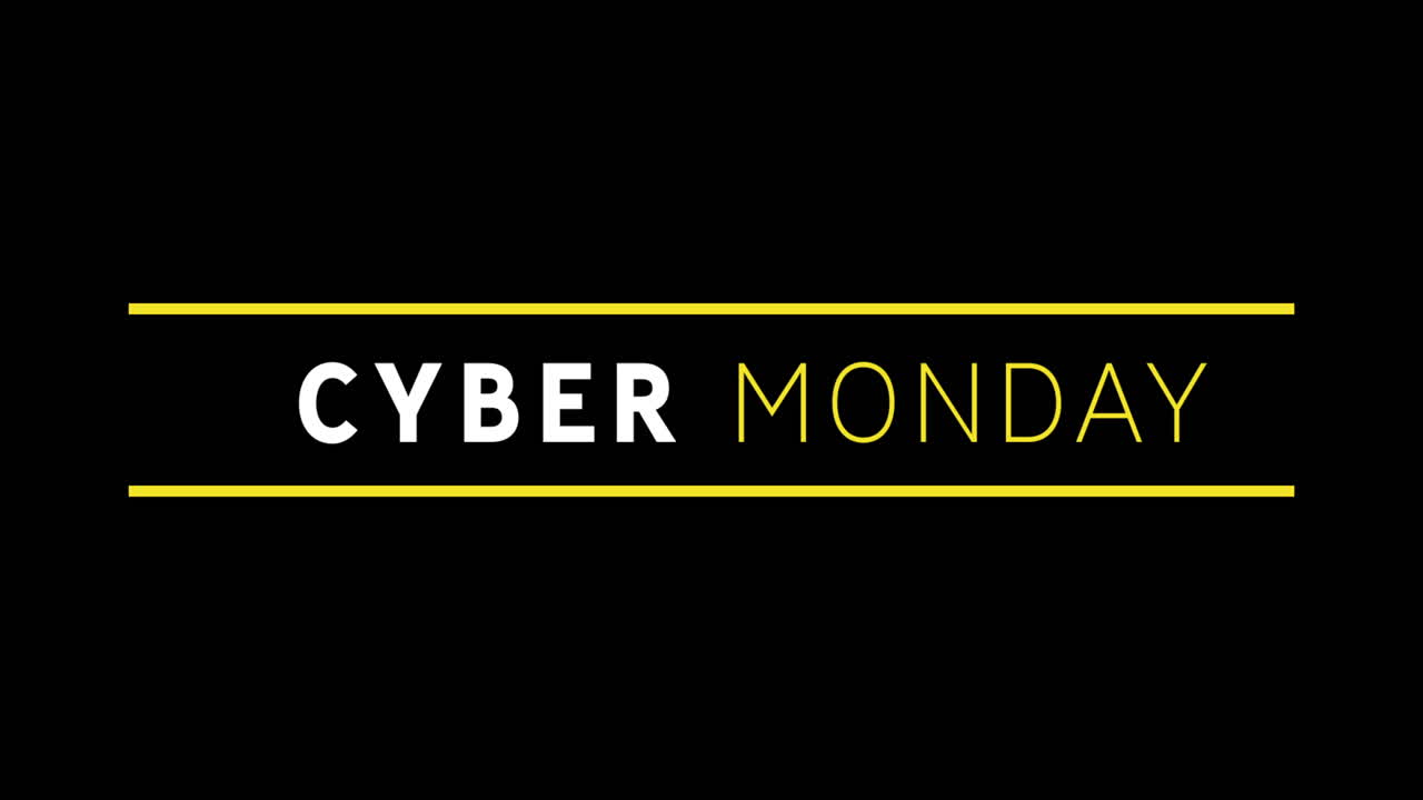 texto blanco y amarillo de cyber monday que aparece contra una pantalla negra