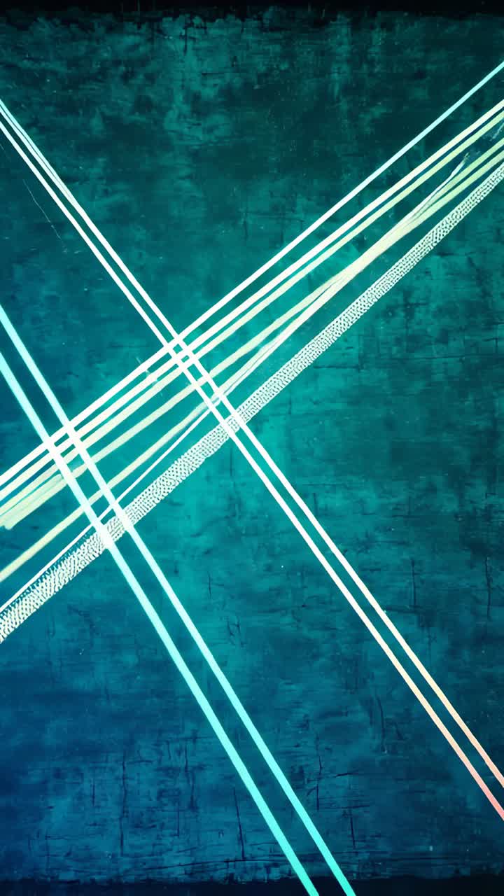 Vertical video: On startup projector casting neon-blue or white beams pulsing on dark wall forming X