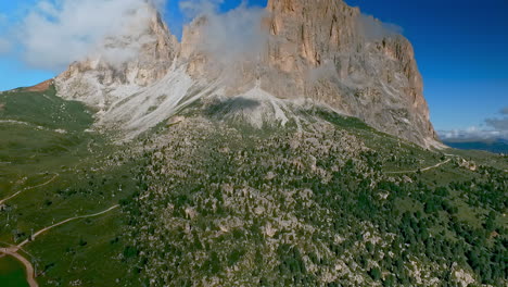 drone shot of a rugged rock face in the alps