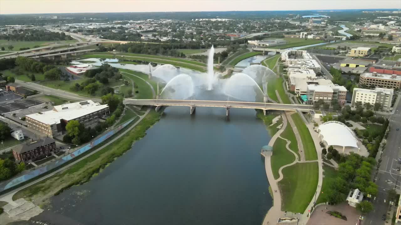 Large river fountain shooting water into the air.