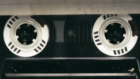 home entertainment close-up playback action of cassette tape recorder