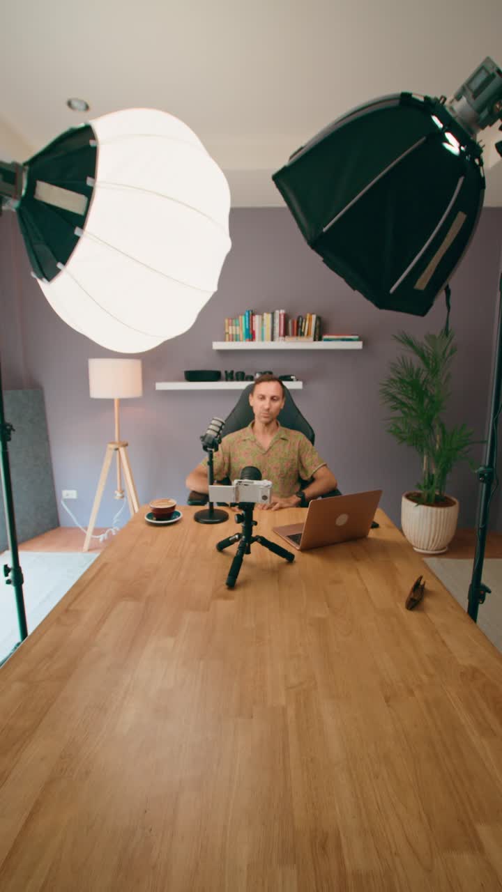 Man Vlogging/Streaming from Home Studio