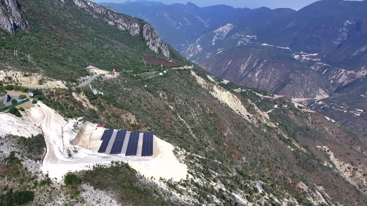 Solar panels on a mountain slope in molanguito, hidalgo, mexico, aerial view