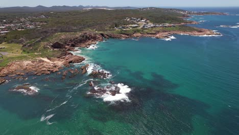 iris moore reserve and fishermans bay in new south wales, australia - aerial drone shot