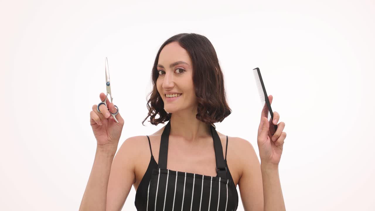 Hairdresser with scissors and comb