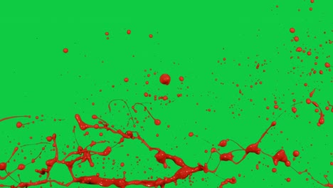 pintura roja salpicando en el medio en cámara lenta aislado en el fondo de la pantalla verde 4k