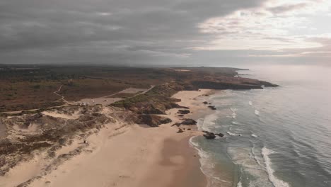 Scenic-Malhão-beach-on-Atlantic-coastline-at-sunset