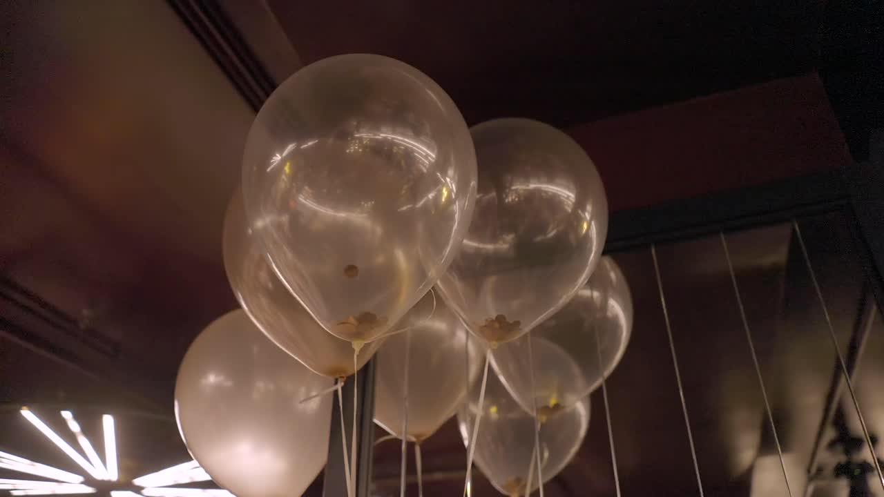 Clear and White Balloons Decorated Room