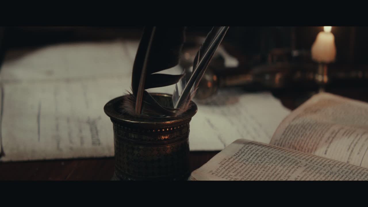An old captain sits down by the old table inside the sailing ship cabin and writes a letter
