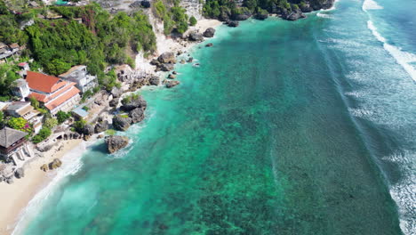 Azure-Blue-Water-Laps-Against-Bingin-Beach-In-Bali-Indonesia