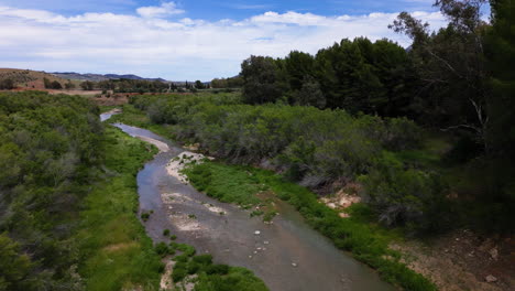 Estepona-river-valley-and-green-landscape,-aerial-drone-view