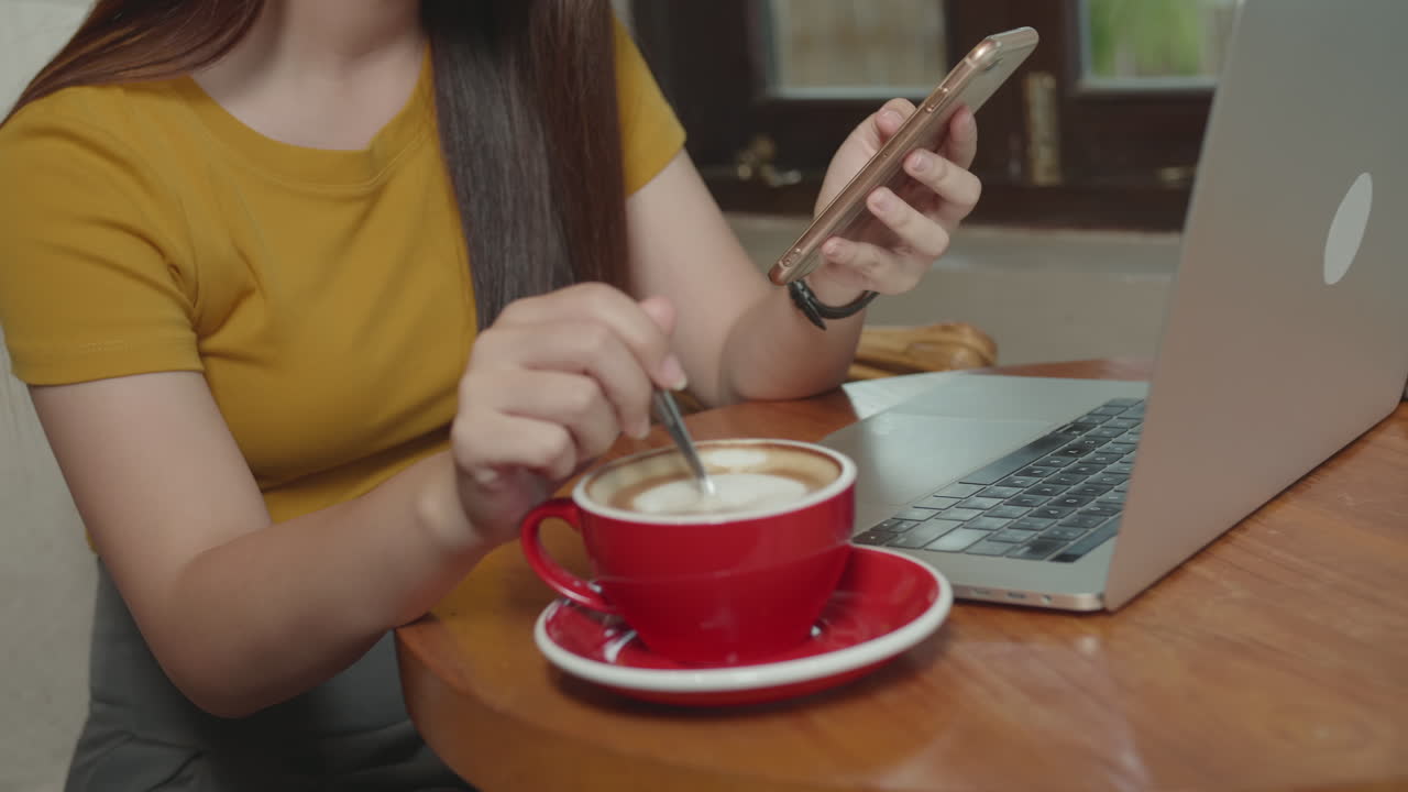 Beautiful Asian Woman Drinking Hot Coffee In Cafe