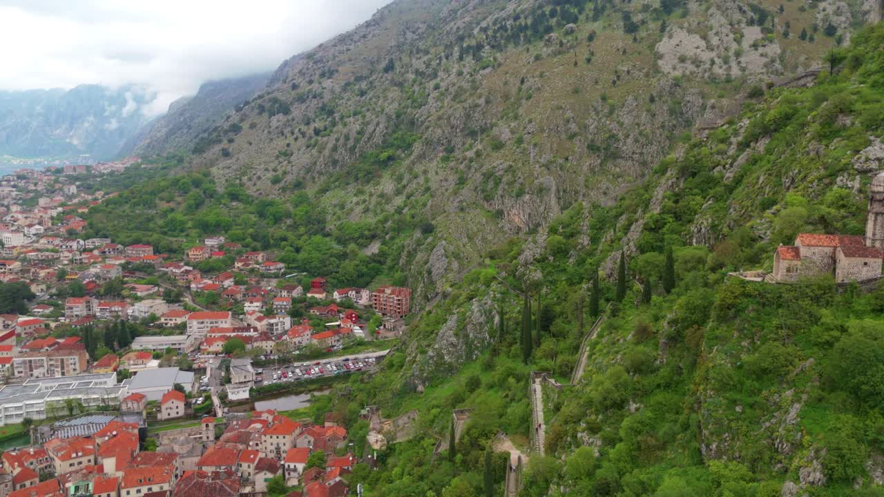 Misty Montenegro Mountains with Church on Hilltop – Aerial Drone View